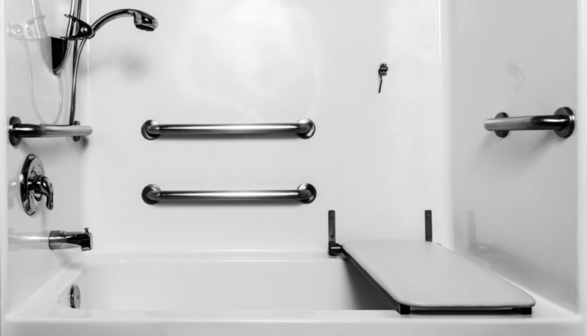 Accessible shower with grab bars and seating
