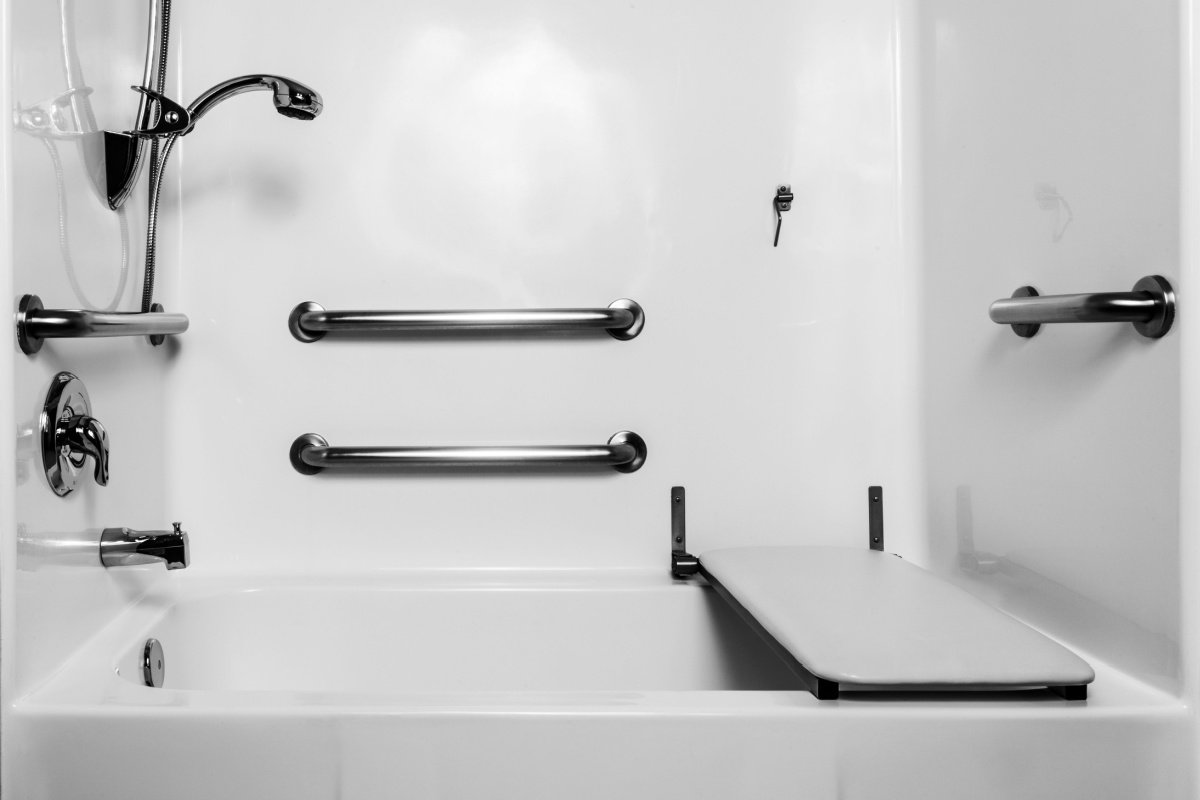 Accessible shower with grab bars and seating