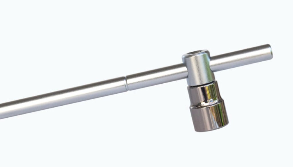 Metal tool with a socket attachment for fastening.